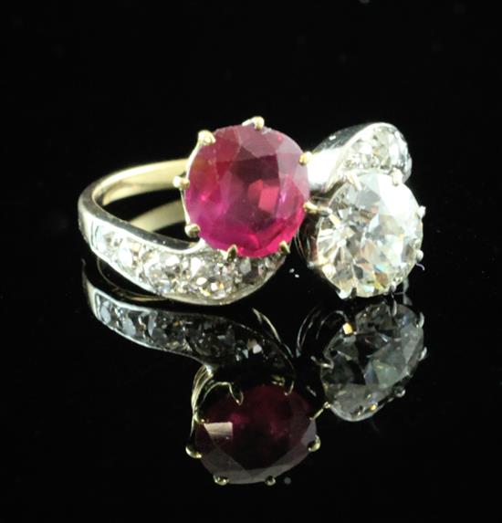 A gold, ruby and diamond crossover ring, size M.